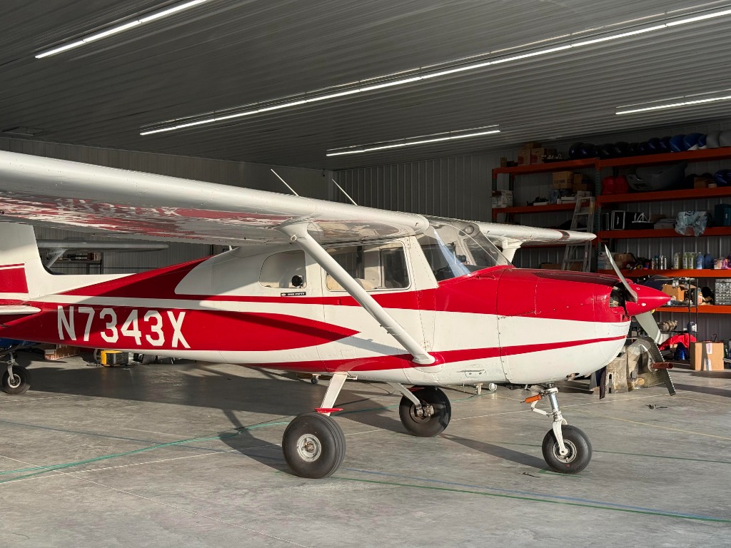 Pattern Altitude Cessna 150 Trainer Aircraft N7343X at KSGS Fleming Field